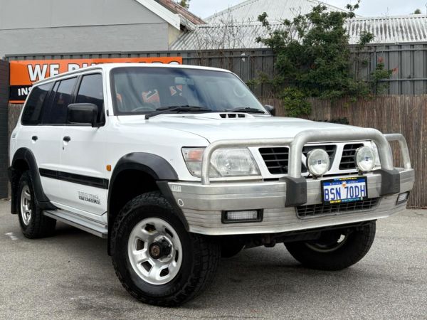 ** 2000 Nissan Patrol GU ST ** Wagon 7 Seaters ** Manual 5sp ** 4x4 ** 2.8L V6 Turbo Diesel ** Sub Tank ** Front Bullbar ** Radio CD w/ Great Sound ** image