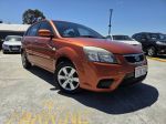 Image for 2010 Kia Rio JB MY10 S Orange 5 Speed Manual Hatchback
