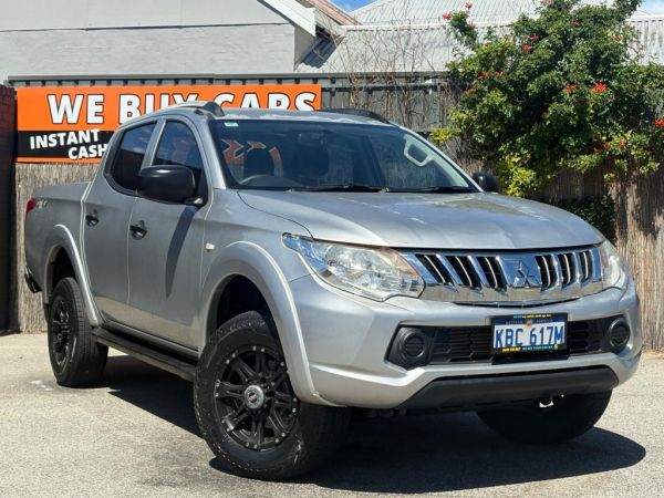** 2015 Mitsubishi Triton MQ GLX ** Utility 4 Doors ** Manual 6sp ** 4x4 ** 2.4L Turbo Diesel ** Low Kms ** Black Rims ** Bluetooth ** 2 Keys ** image