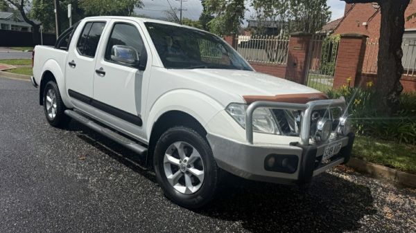 2012 Nissan Navara D40 ST-X 550 (4x4) White Crystal 7 Speed Automatic Dual Cab Utility image