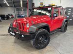 Image for 2015 Jeep Wrangler Unlimited JK MY15 Sport (4x4) Red 5 Speed Automatic Softtop