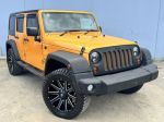 Image for 2012 Jeep Wrangler Unlimited JK MY12 Sport (4x4) Orange 6 Speed Manual Softtop