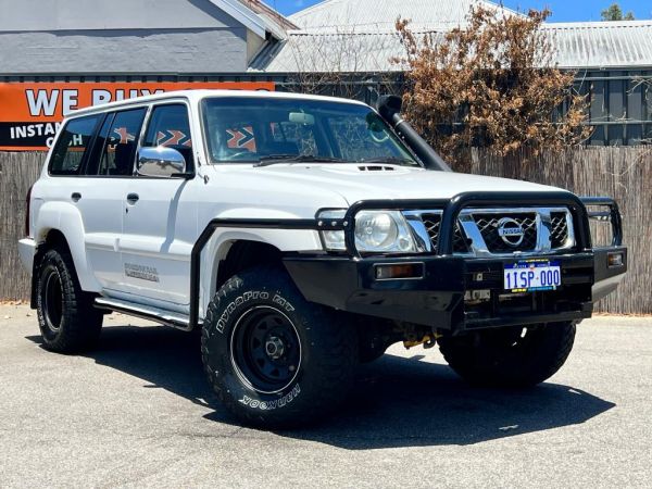 ** 2011 Nissan Patrol GU 7 ST ** Wagon 7 Seaters ** Manual 5sp ** 4x4 ** 3.0L Turbo Diesel ** Snorkel ** Black Rims ** Bluetooth ** Tow Ball ** image