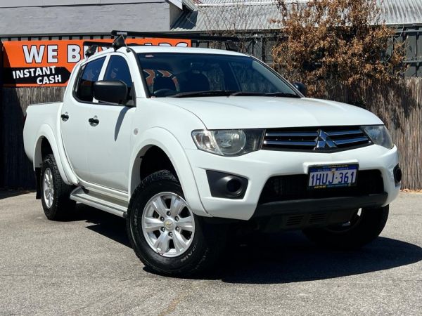 ** 2015 Mitsubishi Triton GLX ** Utility 4 Doors ** Manual 5sp ** 4x4 ** 2.5L Turbo Diesel ** Roof Racks ** Long Registration ** Service up to Date ** image