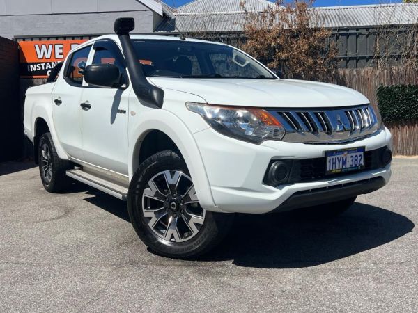 ** 2017 Mitsubishi Triton GLX ** Dual Cab 4 Doors ** Sports Automatic ** 4x4 ** 2.4L Turbo Diesel ** Snorkel + Black Rims + Leather Tonneau Cover ** image