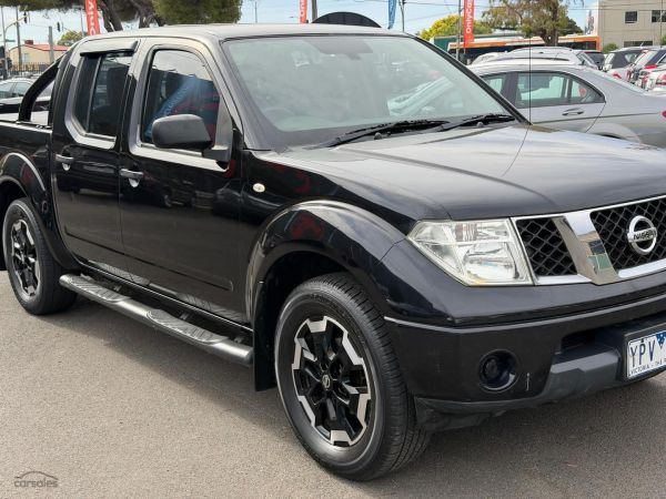 2011 Nissan Navara RX D40 Auto 4x4 MY11 Dual Cab image