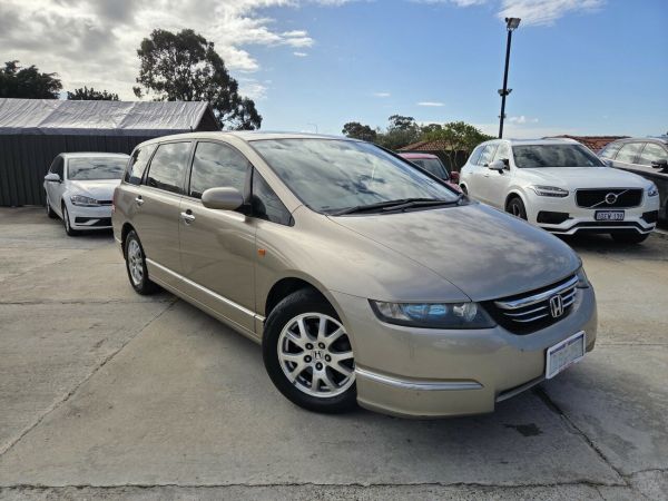 2004 Honda Odyssey 3rd Gen Luxury Gold 5 Speed Sports Automatic Wagon image