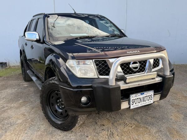 2009 Nissan Navara D40 ST-X (4x4) Black 6 Speed Manual Dual Cab Pick-up image