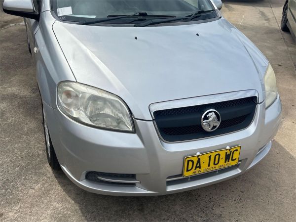 2010 HOLDEN BARINA 4D SEDAN TK MY11 image
