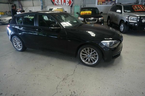 2014 BMW 1 Series F20 MY0713 118i Steptronic Black 8 Speed Sports Automatic Hatchback