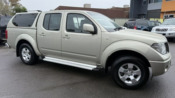 2010 Nissan Navara D40 ST (4x4) Champagne 5 Speed Automatic Dual Cab Pick-up